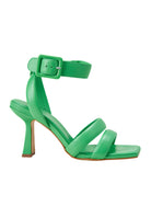 Elegant off-white Brazilian leather heeled sandals for women. Comfortable 8cm heel, versatile open-toe design. Perfect dressy shoes for weddings & events