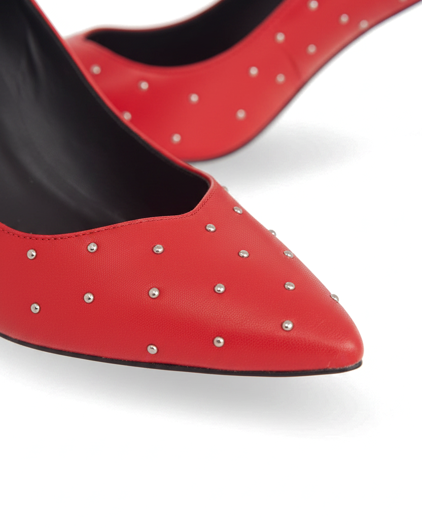 Close up detail of the hand set silver studs on the red leather vamp of the Callisia pumps