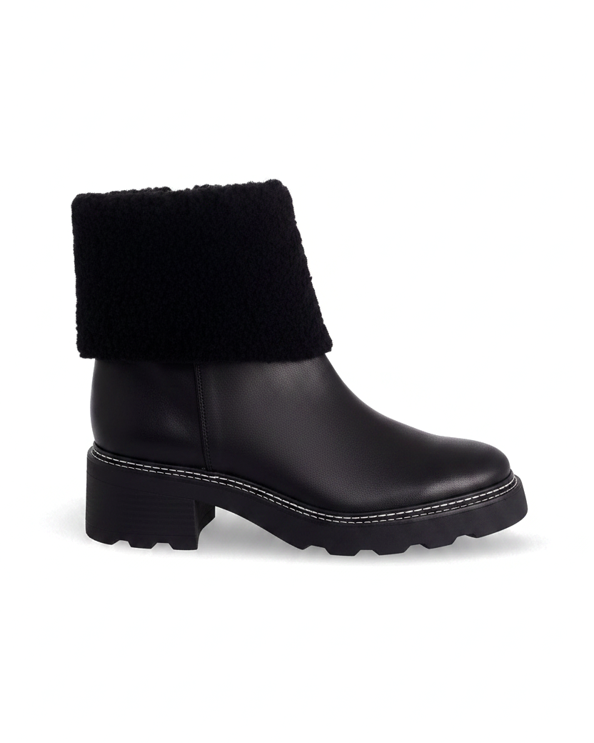 Andira black leather shearling ankle boots side view with lugged sole and 5cm block heel