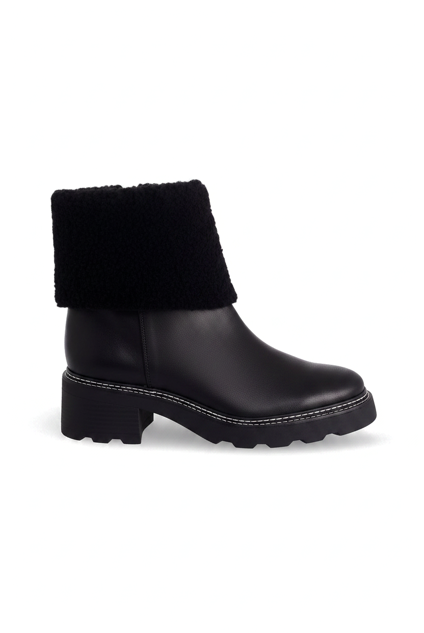 Andira black leather shearling ankle boots side view with lugged sole and 5cm block heel