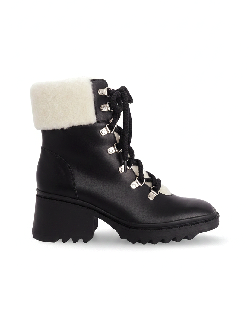 Cassia black leather combat boots side view with shearling collar and lug sole