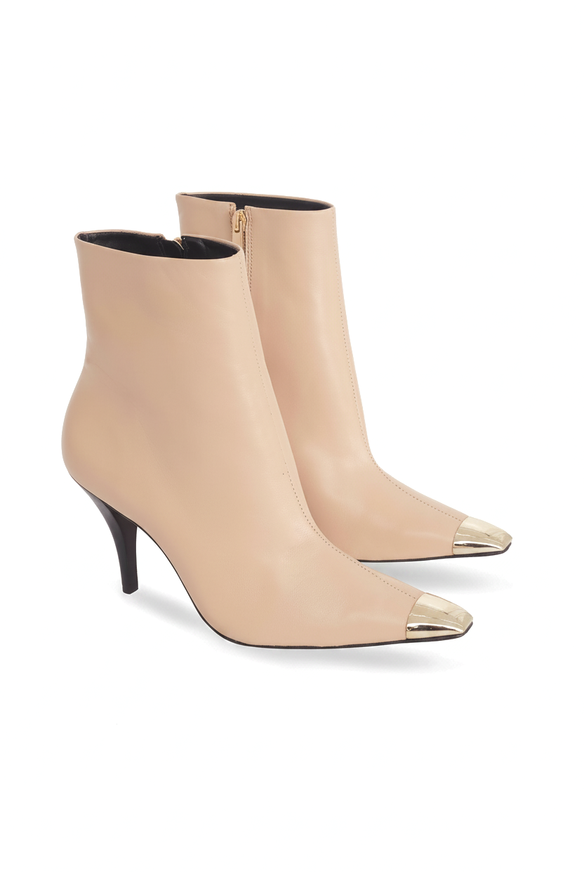 Inga beige leather ankle boots three quarter view showing the gold side zip
