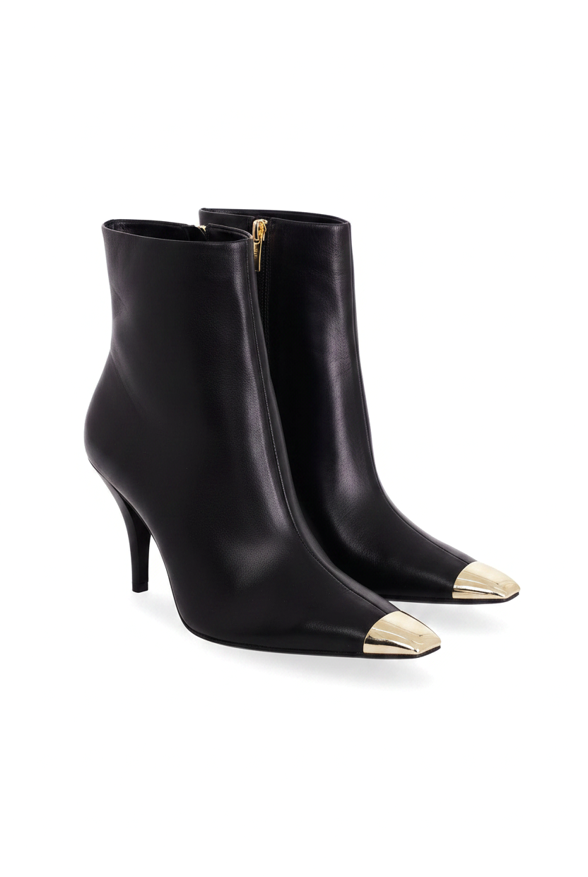 Inga black leather ankle boots three quarter view showing the gold side zip