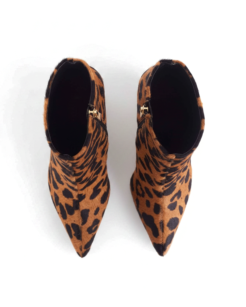 Sapucaia leopard print calf hair ankle boots top view showing gold side zip and black lining