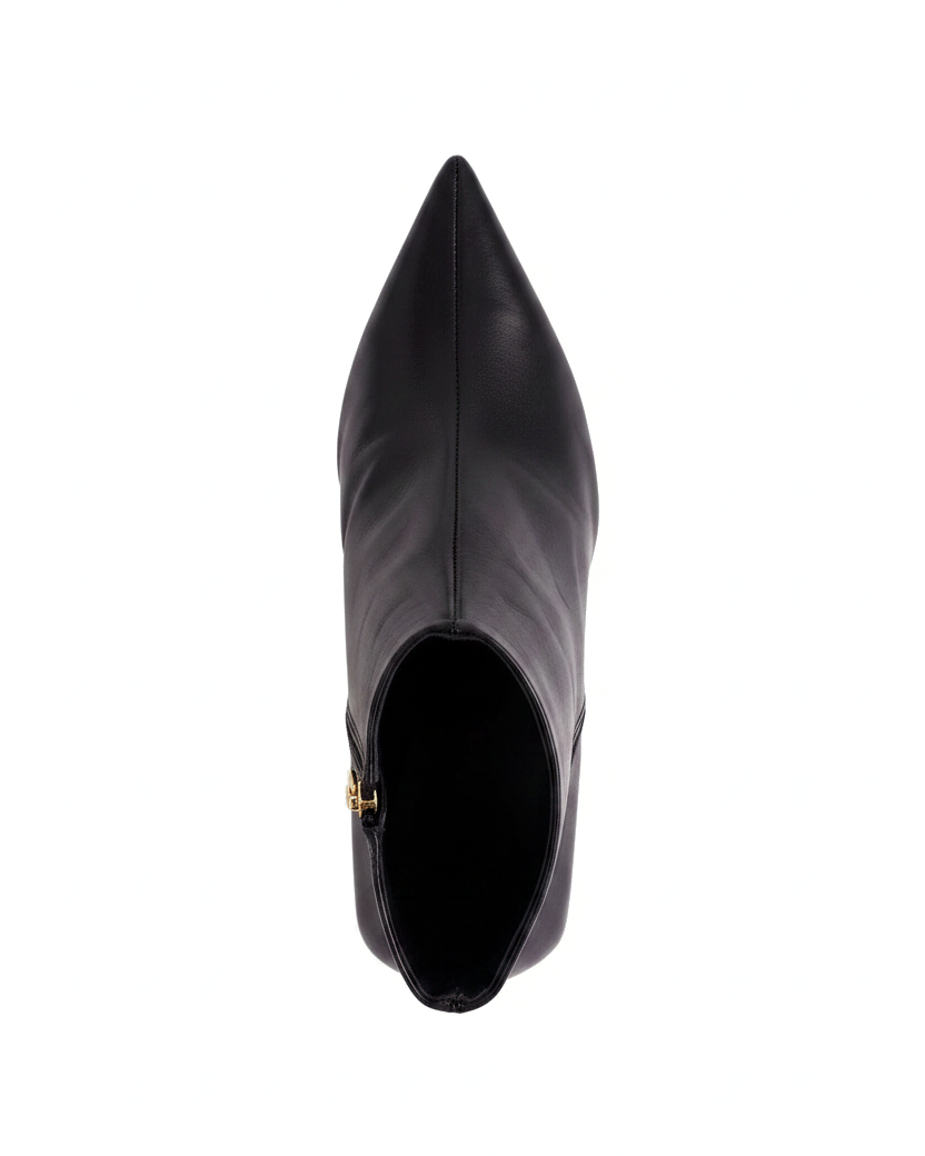 Mabea black leather ankle boots top view showing centre seam, pointed toe and gold zip pull