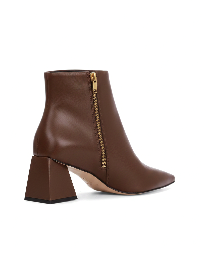 Mabea brown leather ankle boots, three quarter view showing the gold inner zip and flared heel