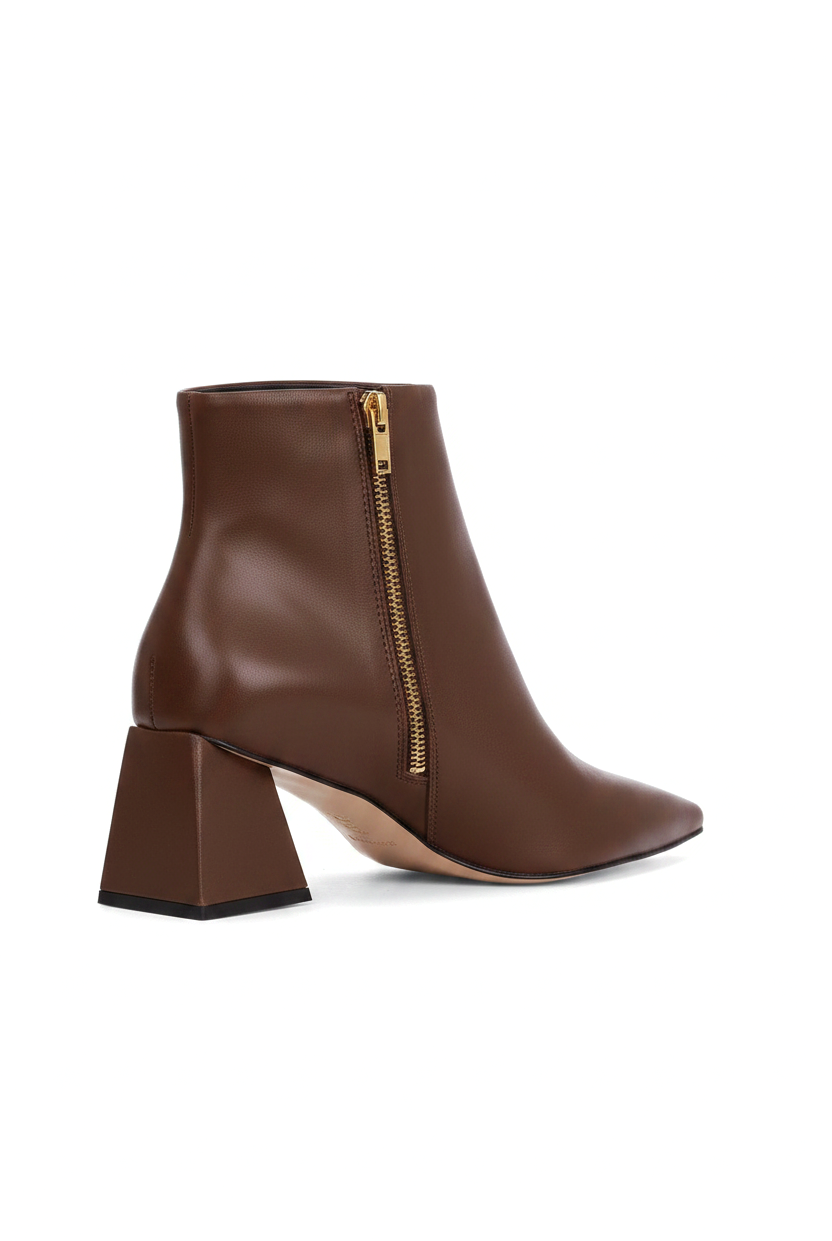 Mabea brown leather ankle boots, three quarter view showing the gold inner zip and flared heel