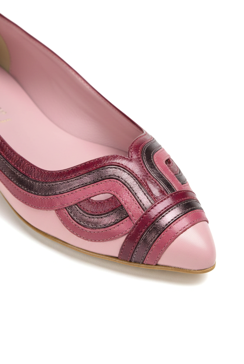Close-up of the layered raspberry and burgundy metallic leather applique on the Mangará Begonia pink ballerina