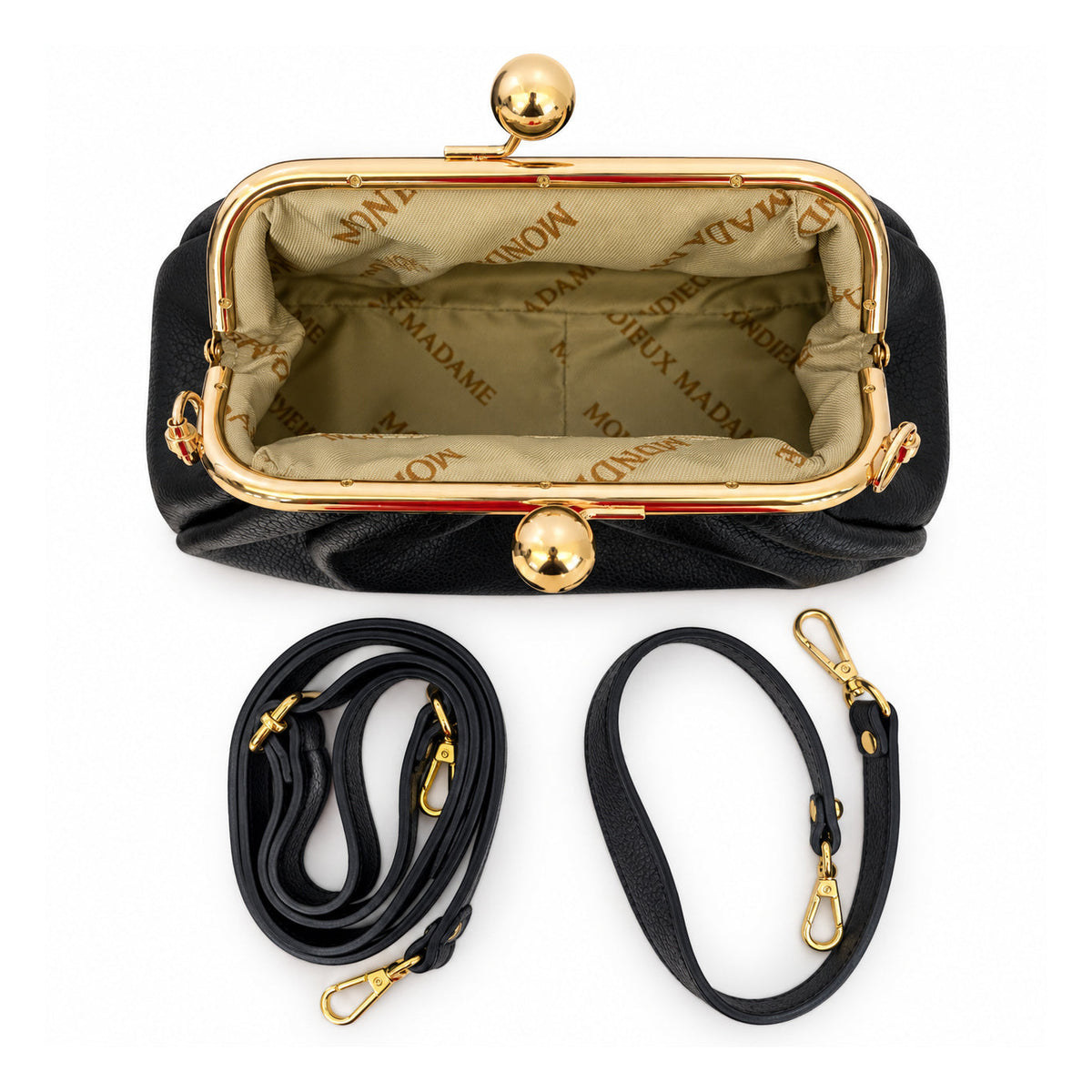 Mondieux Madame Mistery XS leather frame clutch, open view showing the printed lining and two straps.