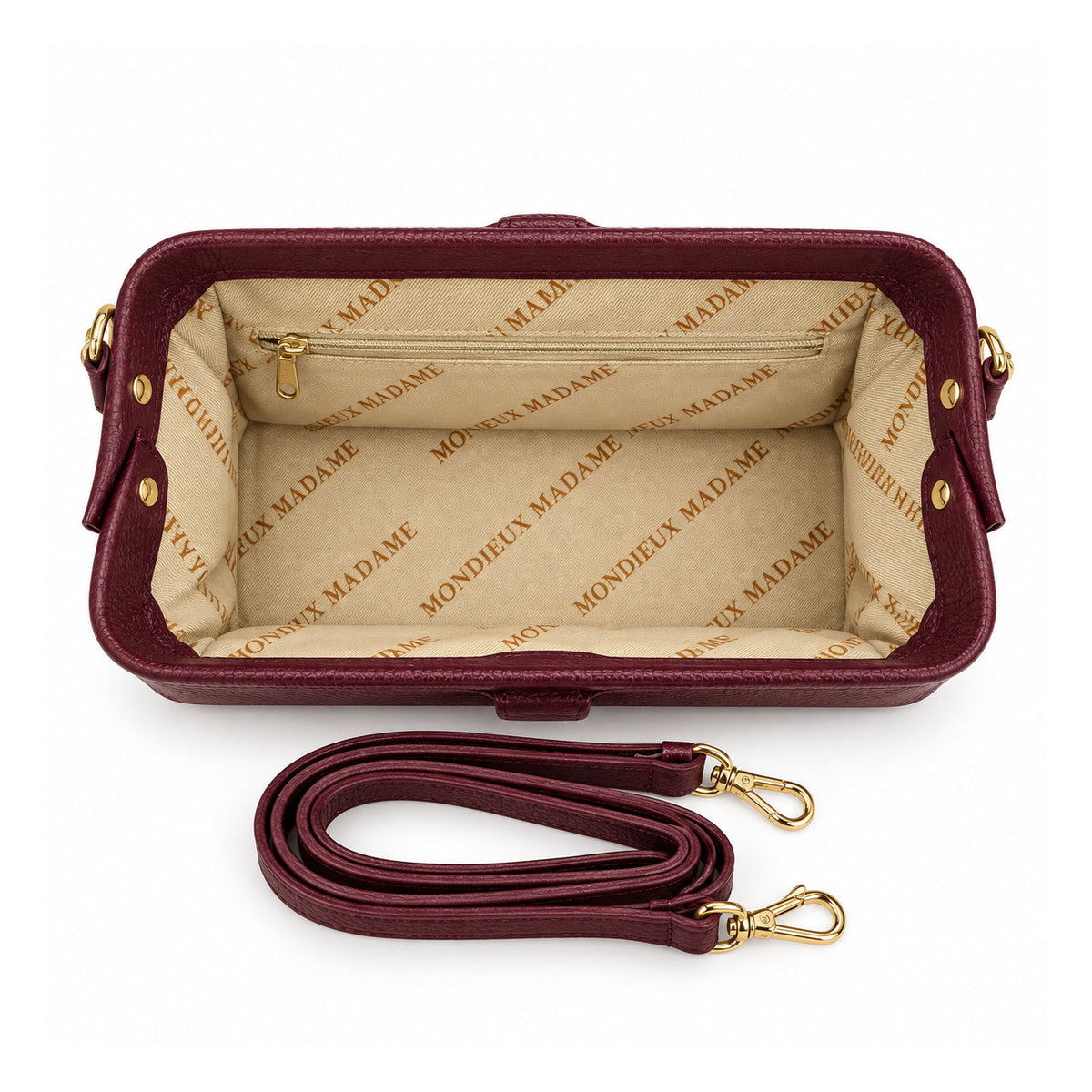 Mondieux Madame Rosanne bordeaux leather frame bag, open view showing the printed lining, zip pocket and strap.