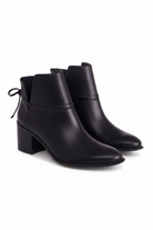 Attalea black leather ankle boots three quarter view showing almond toe and leather ankle band