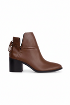 Attalea brown leather ankle boot side view showing the ankle strap, back bow and black stacked block heel