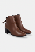 Attalea brown leather ankle boots three quarter view showing the pair, ankle strap and almond toe