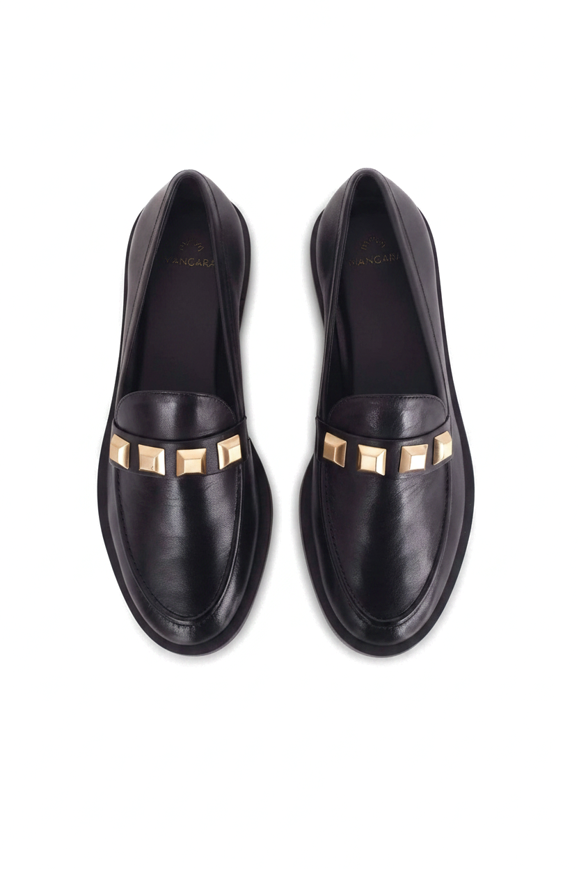Caete black leather loafers top view showing the three gold pyramid studs on each shoe