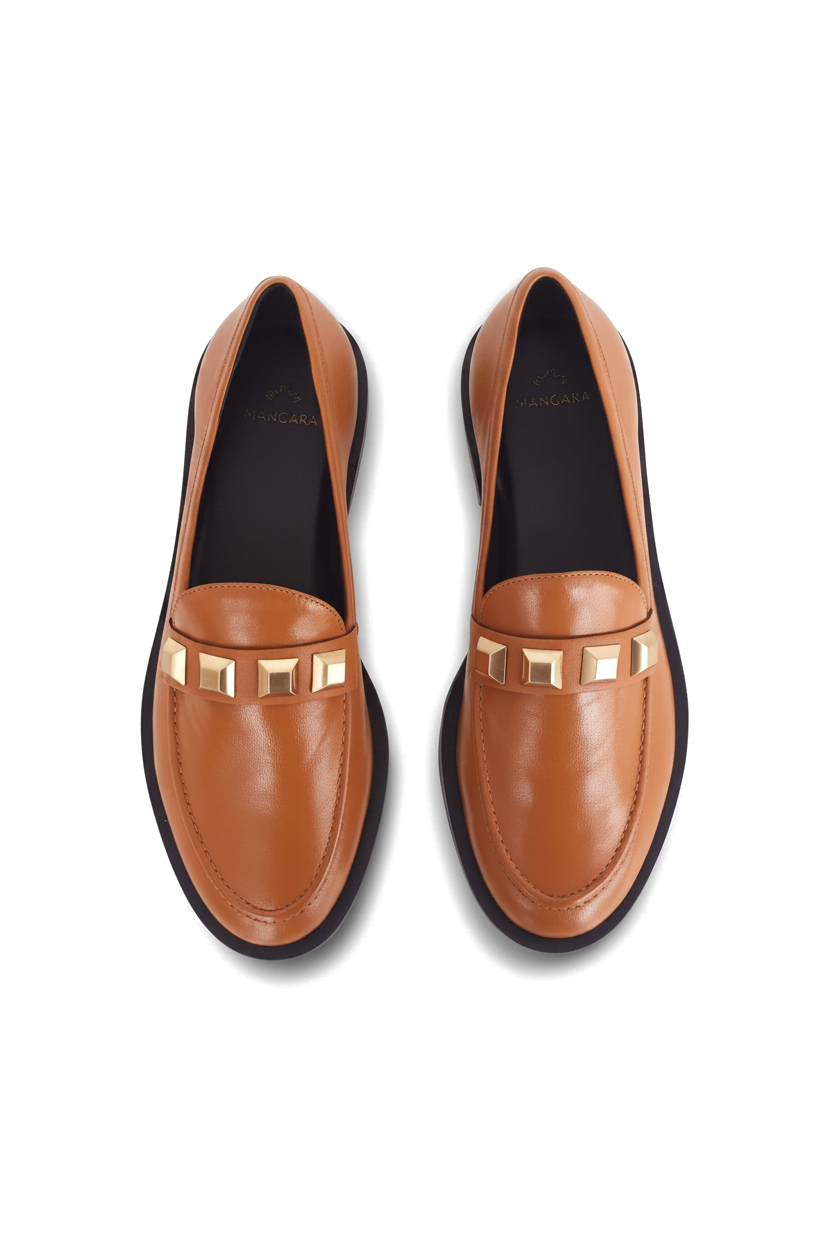 Caete caramel leather loafers top view showing the four alternating gold studs on each shoe