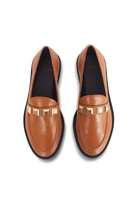 Caete caramel leather loafers top view showing the four alternating gold studs on each shoe
