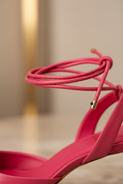 Close-up of Mangará Jaborandi pink leather slingback heel ankle tie strap detail with gold hardware
