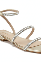 Close-up of the crystal-set straps on Mangara Atelier Aroeira Gold Leather Flat Sandals - SKU 222B01NA