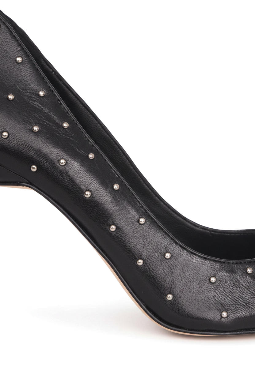 Close-up of the hand-set silver studs on the Mangará Callisia black leather pump