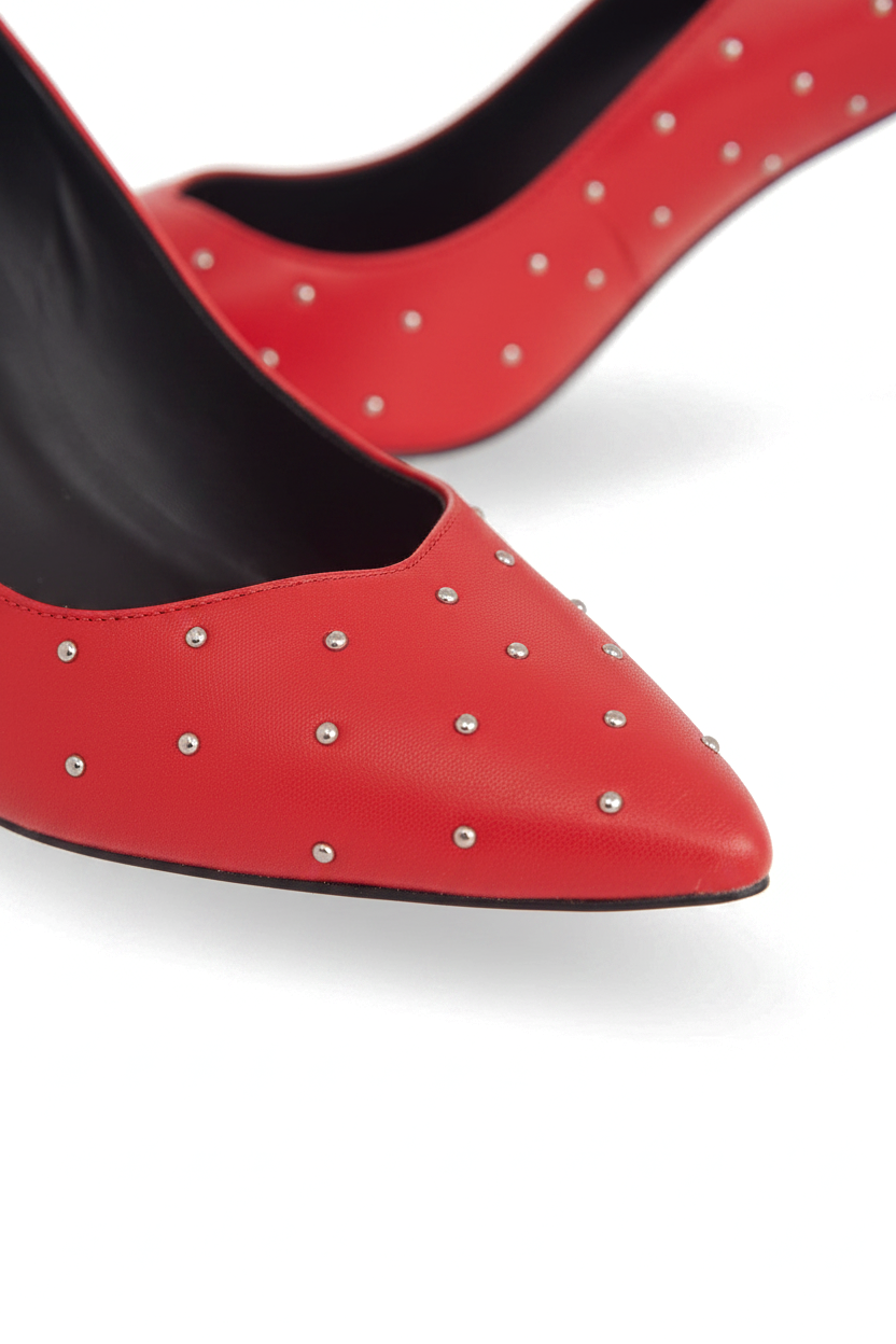 Close up detail of the hand set silver studs on the red leather vamp of the Callisia pumps