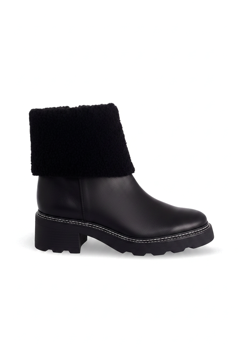 Andira black leather shearling ankle boots side view with lugged sole and 5cm block heel