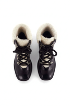 Cassia black leather combat boots top view showing the cream shearling collar and tongue