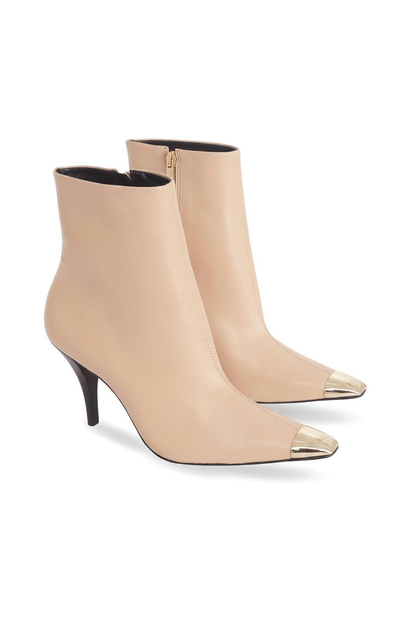 Inga beige leather ankle boots three quarter view showing the gold side zip