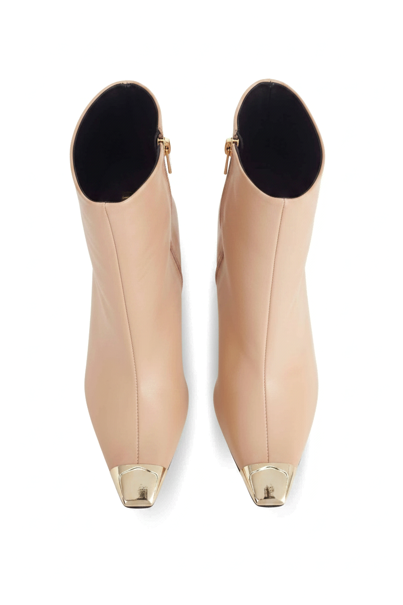 Inga beige leather ankle boots top view showing the pointed gold toe caps