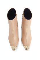 Inga beige leather ankle boots top view showing the pointed gold toe caps