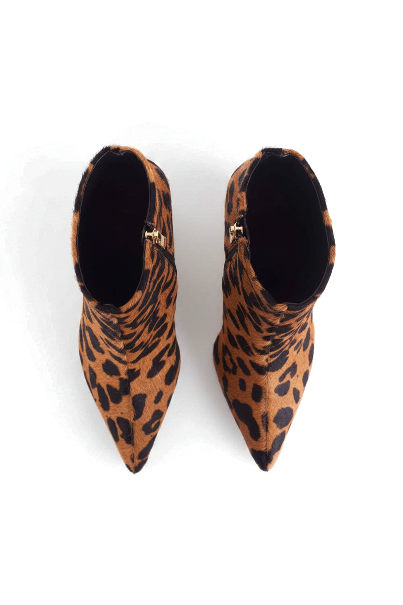 Sapucaia leopard print calf hair ankle boots top view showing gold side zip and black lining