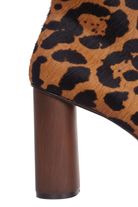 Close up detail of the calf hair texture and cylindrical wooden heel on the Sapucaia boots
