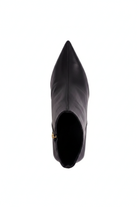 Mabea black leather ankle boots top view showing centre seam, pointed toe and gold zip pull