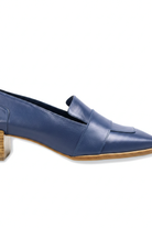 Close-up of the vamp strap and stacked wooden heel on Mangara Atelier Louro Blue Loafers - SKU MOBL