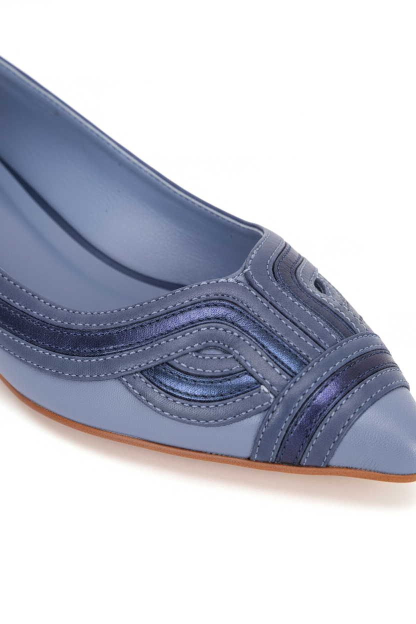 Close-up of the layered navy and indigo metallic leather applique on the Mangará Begonia blue ballerina