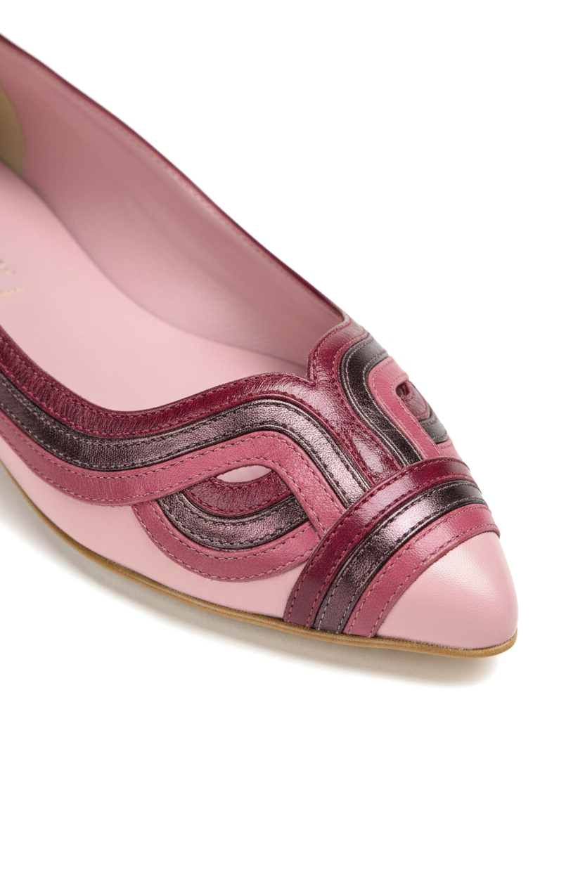 Close-up of the layered raspberry and burgundy metallic leather applique on the Mangará Begonia pink ballerina