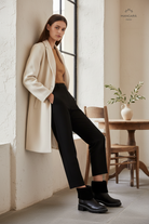 Andira Black Leather Ankle Boots – Shearling Collar, 5cm Block Heel — AI-generated editorial photo
