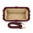 Mondieux Madame Rosanne bordeaux leather frame bag, open view showing the printed lining, zip pocket and strap.